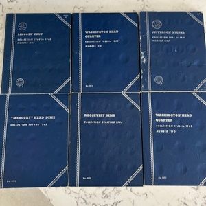 Six vintage coin holders.